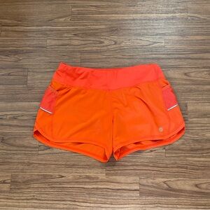 Athleta orange shorts